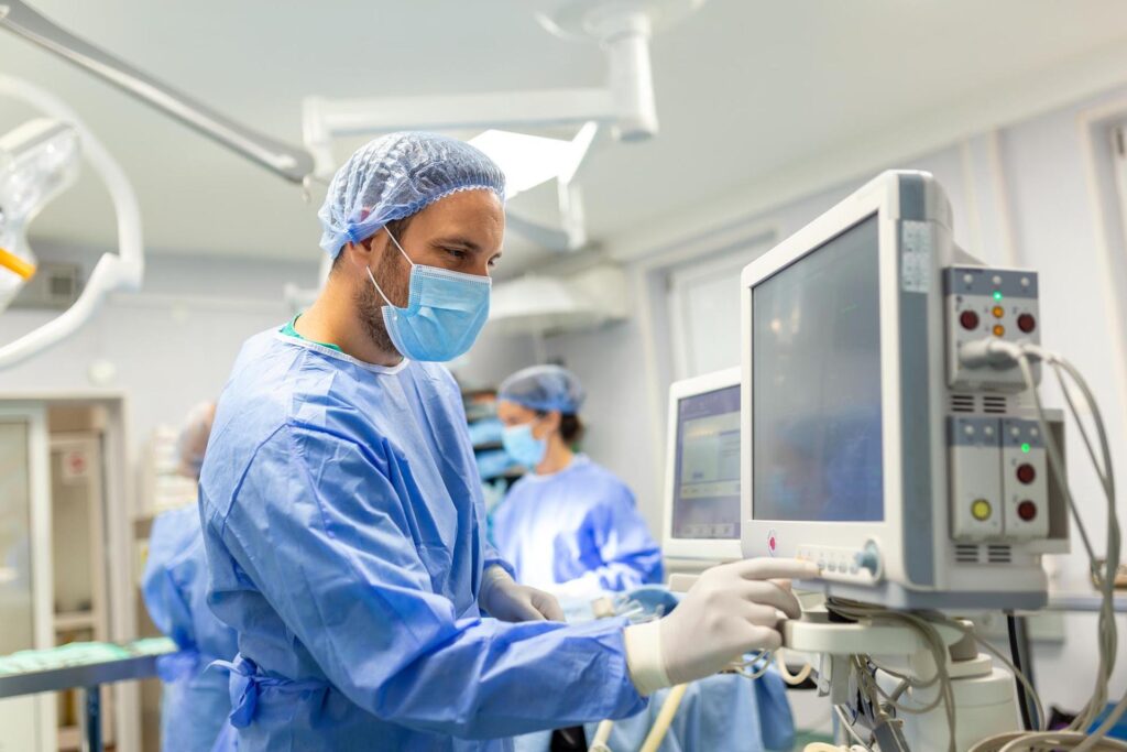 medical-ventilator-being-monitored-by-anaesthetist-surgeon-using-monitor-operating-room