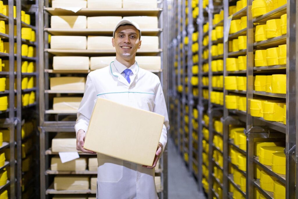 technologist-with-cheese-his-hands-make-inspection-ready-prooduction-department-dairy-factory